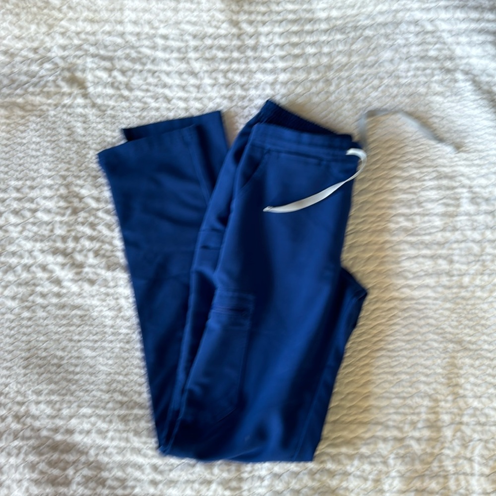 Figs winning blue yola scrub pants. Extra small/tall